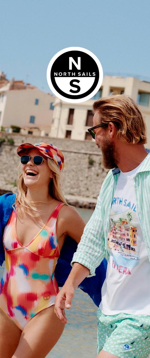 Maillot de bain présentant un motif abstrait coloré ; femme dans un maillot une pièce rose et orange, homme en T-shirt blanc et shorts vert menthe.