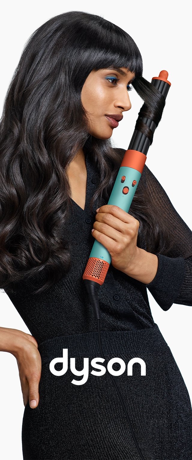 Dyson Styling-Tool in Teal und Orange mit Tasten, das ein zylindrisches Fass zeigt, das dunkles, gewelltes Haar hält, vor einem weißen Hintergrund.