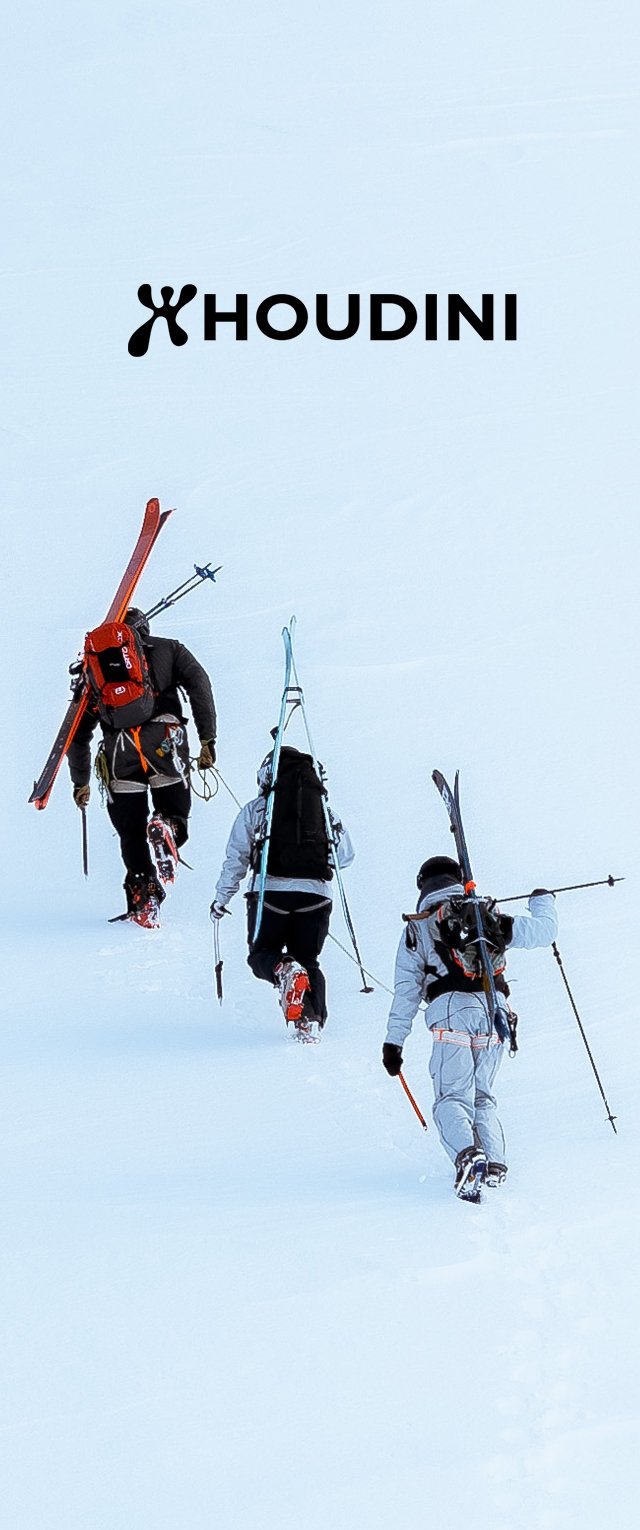 Three skiers wearing backpacks climb a snowy slope carrying skis and poles, with "Houdini" logo above on a pale blue background.