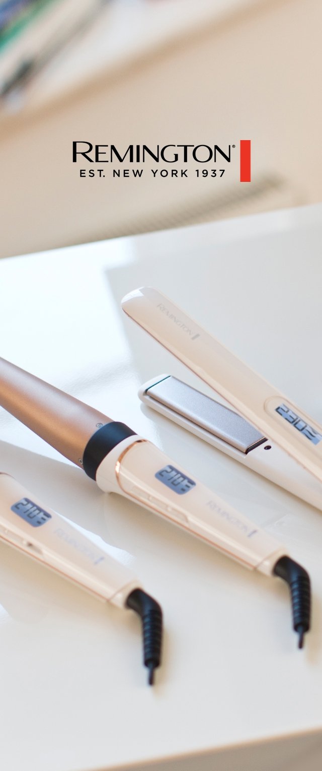 Tres herramientas de estilismo para el cabello Remington con pantallas digitales de temperatura, colocadas sobre una superficie blanca, con el logotipo de la marca encima.
