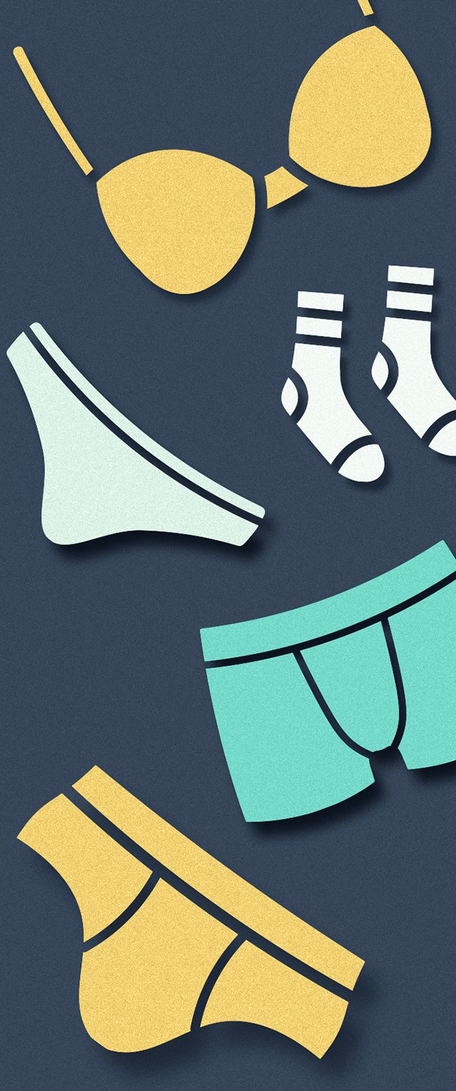 Una colección de ropa interior colorida que presenta un sujetador amarillo, unas braguitas azul claro, unos boxers turquesa y calcetines con patrones sobre un fondo oscuro.