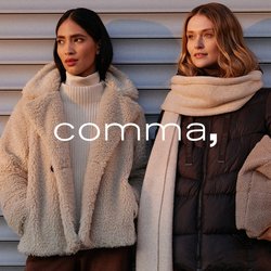 Dvě ženy stojí vedle sebe, jedna má na sobě béžový chlupatý kabát a druhá tmavou péřovou bundu. K té je přidán světlý šátek.