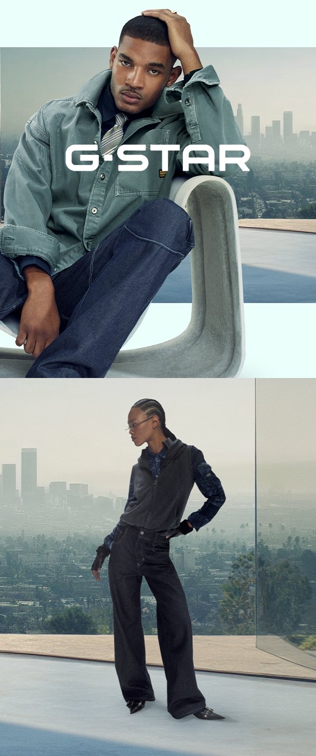 Giacca di denim, azzurro chiaro, vestibilità rilassata; jeans scuri, a gamba larga; tessuto testurizzato con accenti minimi; sfondo minimalista con vista sulla città.