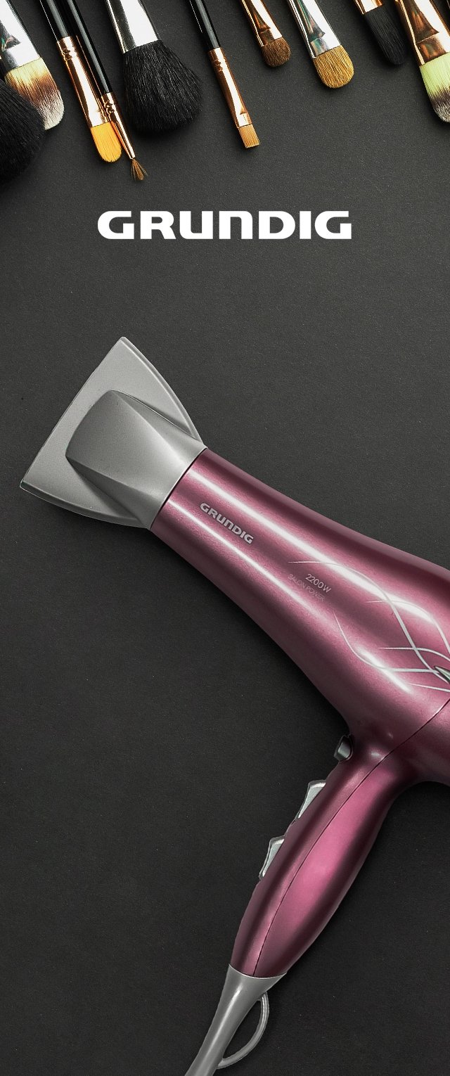 Lila Haartrockner mit elegantem Design, ausgestattet mit einer silbernen Düse und einem ergonomischen Griff. Mit 2200W gekennzeichnet, Logo an der Basis sichtbar. Bürsten im Hintergrund.