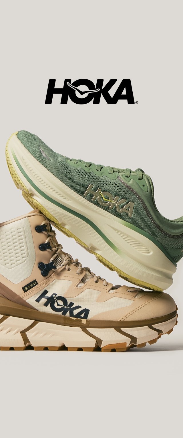 Zapatillas de correr Hoka con parte superior de punto verde y parte inferior beige con un patrón texturizado, que cuentan con una suela acolchada y una marca prominente.