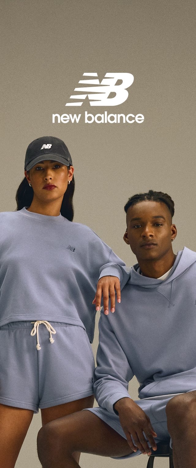 Two individuals wear matching light blue athletic apparel made of soft fabric; a sweatshirt and shorts for one, a hoodie for the other.