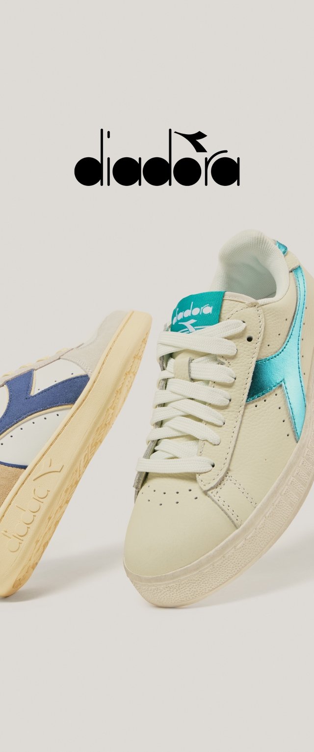 Beige sneakers met blauwe en teal accenten. Glad leermateriaal, ronde neus en een textielrubberen zool. Voorzien van een vetersluiting en logo.