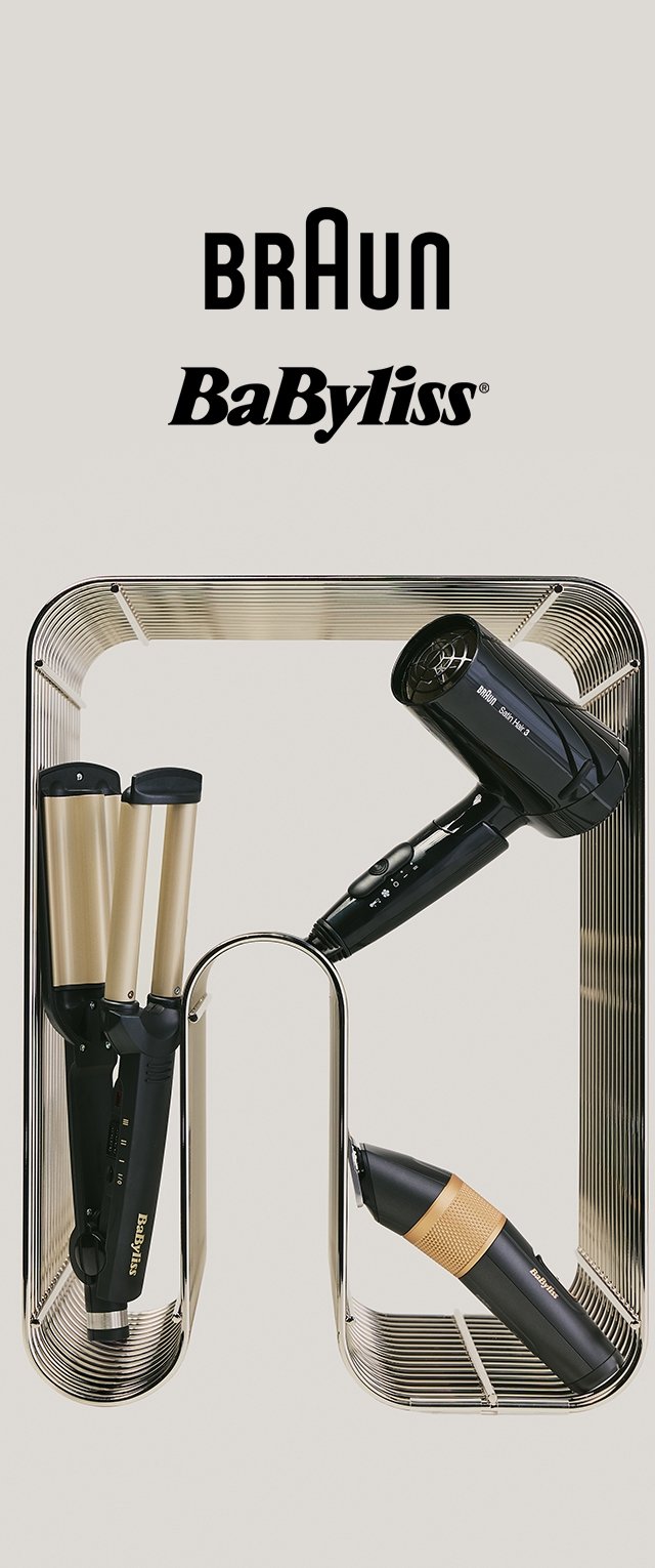 Herramientas de peinado para el cabello Braun y BaByliss que incluyen un secador de pelo negro, rizador y cortapelos con acentos dorados en un soporte metálico.